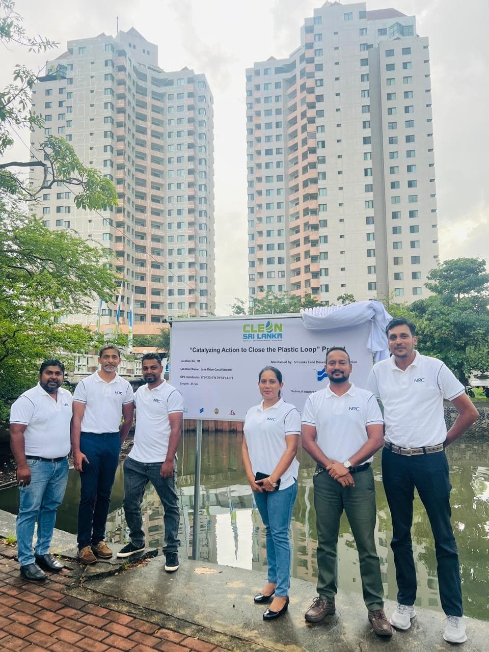 The NRC team in front of the Clean Sri Lanka project signboard at a canal strainer site in Colombo.